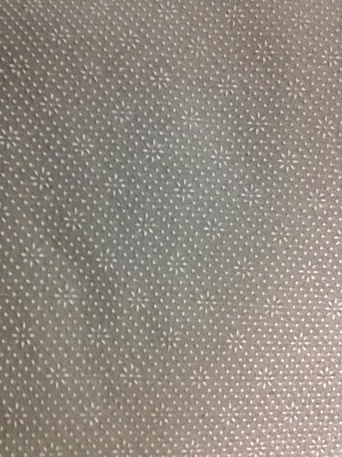 无纺布白太阳花点塑